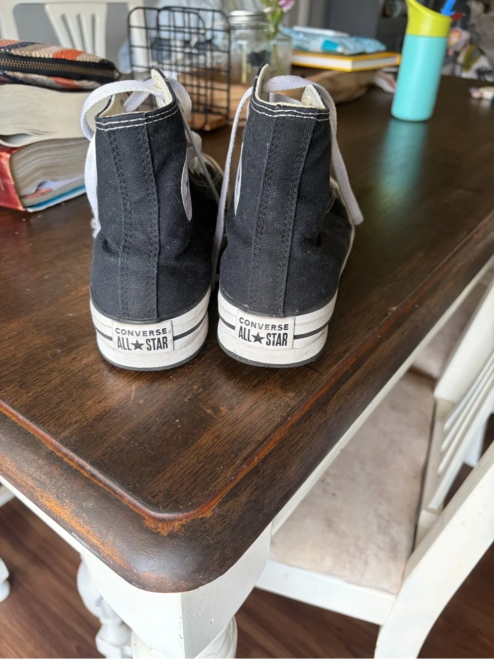 Converse Chuck Taylor’s Black and White High Top Sneakers